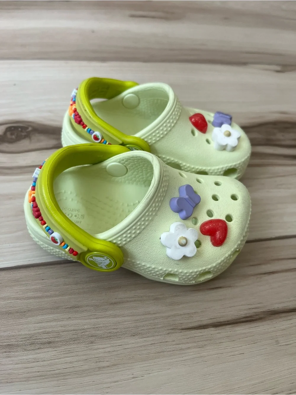 Crocs Baby Classic Friendship Bracelet Clog in Lime Green with Charms